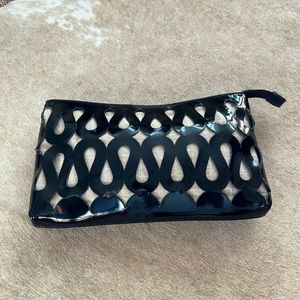 Sondra Roberts black patent leather clutch